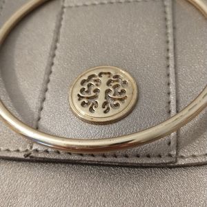 Metal ring handle crossbody bag